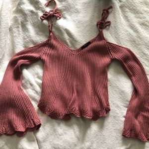 knitted like long sleeve open shoulder top.
